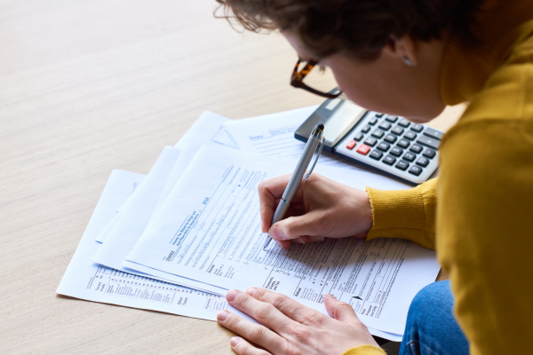 Woman filling out tax form